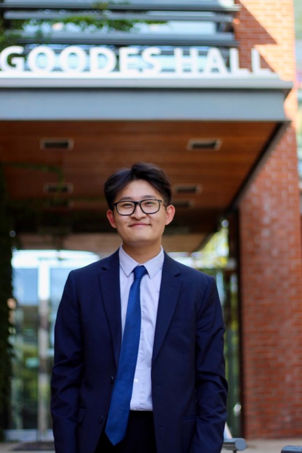 Matthew, an AdmissionPrep student, outside Goodes Hall at the Smith School of Business, Queen's University